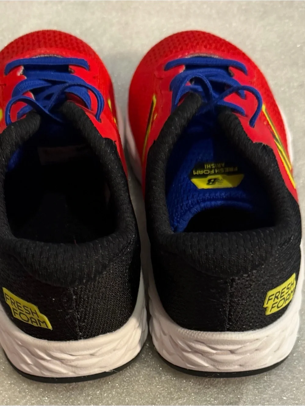 New Balance Red Kids Sneakers with Blue Laces